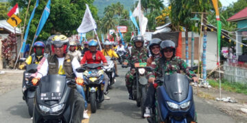 Bendera Petaka KPK Gorut Diarak Dari Ujung Pantai Utara Kecamatan Tolinggula