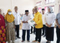 Bupati Gorut Salurkan Bantuan Pangan Kepada Sejumlah KPM Di Kecamatan Atinggola