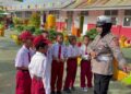 Polantas Menyapa di SDN 5 Kwandang: Bripka Irni Tanamkan Tertib Berlalu Lintas Sejak Dini