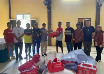 Anggota DPRD Gorontalo Utara Haris Tuina Salurkan Bantuan untuk Warga Terdampak Banjir di Desa Dambalo